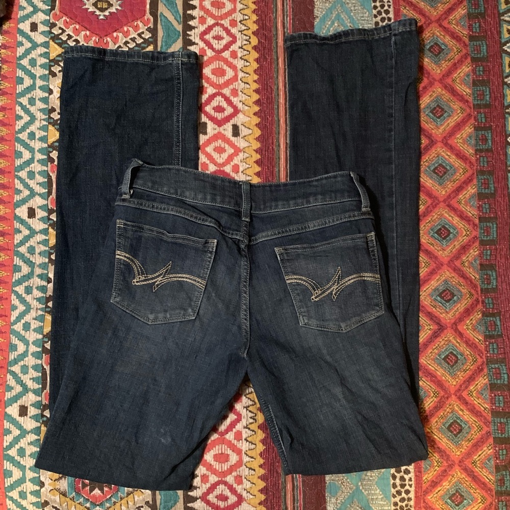 5/6x34 bootcut Wrangler Jeans.